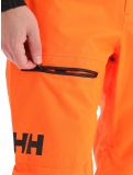 Miniatura Helly Hansen, Sogn Cargo pantaloni da sci senza imbottitura uomo neon arancio 