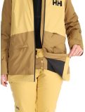 Miniatura Helly Hansen, W Powchaser 2.0 giacca sci donna Sand giallo 